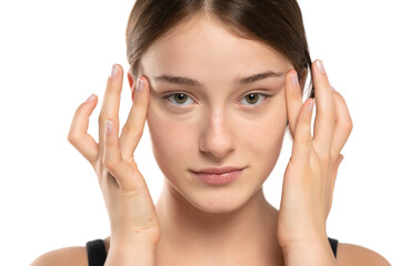 Woman  applying concealer on flawless fresh skin, doing make up. Girl  put corrector under eye area.