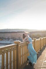 young woman on a bridge in Budapest - 786543744