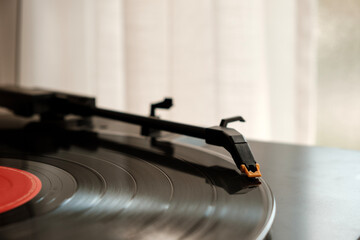 Close-up of turntable playing a record.