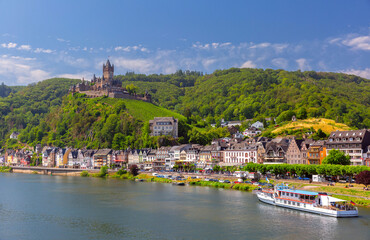 Fototapeta na wymiar View of sunny Cochem with Reichsburg castle, beautiful town on romantic Moselle river, Germany