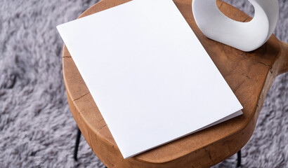 blank magazine mockup on coffee table with vase and grey rug