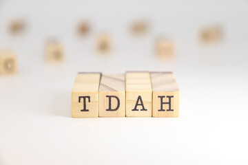 abbreviation for attention deficit hyperactivity disorder in Spanish TDAH letters isolated on white background.