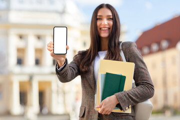 Student presenting smartphone screen to camera, mockup