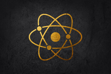 Golden Science symbol atom, isolated on a black background