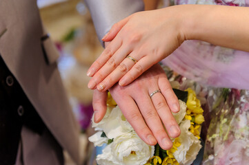 Obraz na płótnie Canvas 結婚指輪、マリッジリング、新郎新婦の手元