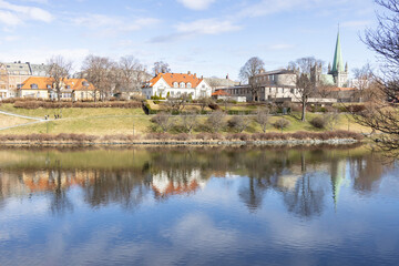 Walking along Nidelven (River) in a Spring mood in Trondheim city - 786576763