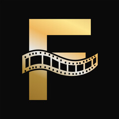 Fototapeta na wymiar Letter F with Films Roll Symbol. Strip Film Logo For Movie Sign and Entertainment Concept