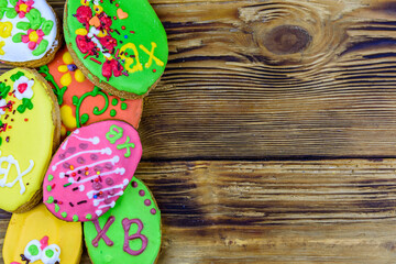 Easter cookies in plate on a wooden background. Top view