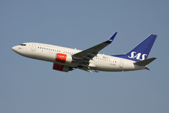 Dusseldorf, Germany - April 22, 2011: Scandinavian Airlines SAS Boeing 737-700 with registration LN-RNW just airborne at Dusseldorf Airport