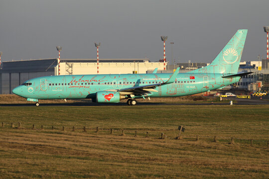 Dusseldorf, Germany - January 15, 2012: Turkish SunExpress Boeing 737-800 with registration TC-SUZ in special Impressions of Istanbul livery on taxiway at Dusseldorf Airport