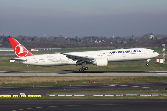 Dusseldorf, Germany - March 25, 2012: Turkish Airlines Boeing 777-300 with registration TC-JJI on short final for Dusseldorf Airport