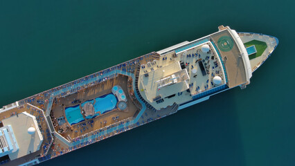 Sailing cruise ship aerial top view