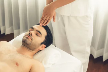 Foto auf Acrylglas Caucasian man enjoying relaxing anti-stress head massage and pampering facial beauty skin recreation leisure in dayspa modern light ambient at luxury resort or hotel spa salon. Quiescent © Summit Art Creations