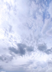 Sky with white clouds. Cloudy weather in summer day.