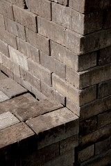bricks stacked high in rows