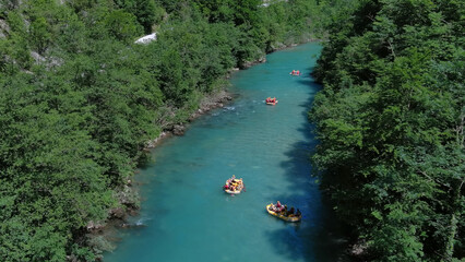 Rafting boat on summer mountain river - 786592381