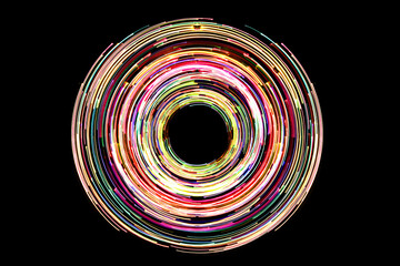 Abstract neon circle lines with empty copy space inside isolated on black background. Colorful led lights long exposure rotation photo.