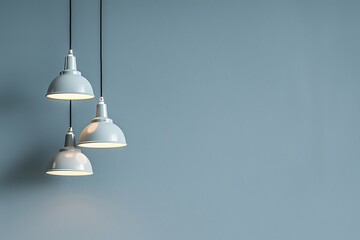Obraz premium Ceiling lamps with bulbs on grey background