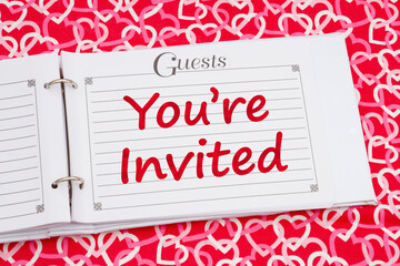 Youre Invited with retro old white and black guest book with red and white hearts - 786607386