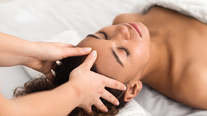 Face massage for an African American lady