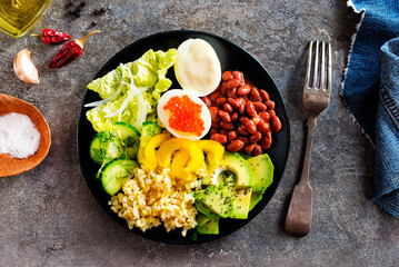 Buddha bowl, balanced food, vegetarian menu. Eggs, avocado, salad lettuce, bulgur, spice - 786626516