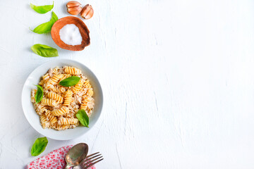 boiled pasta with minced meat and basil