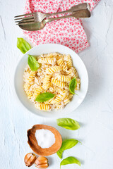 boiled pasta with minced meat and basil