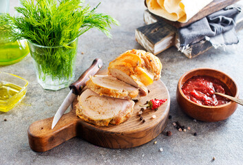 baked meat roll with spice on wooden board - 786628966