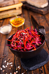 Fresh vegetable salad with sauerkraut cabbage, grated carrots and beetroots