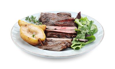 Pieces of delicious roasted beef meat, caramelized pear and greens isolated on white