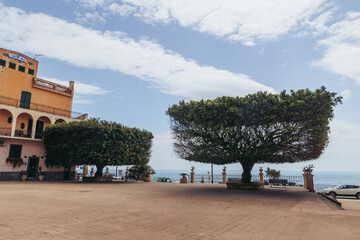 Town Hall Square in Giardini Naxos in the Metropolitan City of Messina on the island of Sicily,...