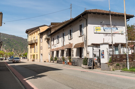 Bissone, Ticino, Switzerland - April 21, 2024: Main street of Bissone, is a Swiss municipality of Ticino, overlooks of Lake Lugano, in the district of Lugano