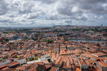 Aerial view from tower of Clerigos Church in Porto city, Portugal with Douro River and Vila Nova de Gaia city on background