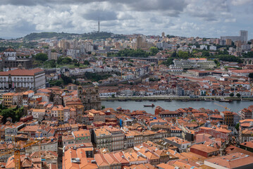 Aerial view from tower of Clerigos Church in Porto city, Portugal with Douro River and Vila Nova de Gaia city on background - obrazy, fototapety, plakaty