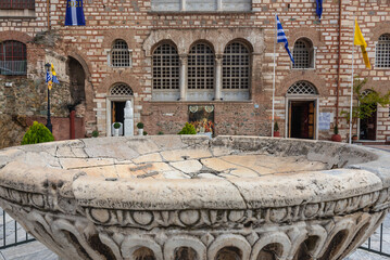 Thessaloniki, Greece - October 12, 2021: Font in front of Church of Saint Demetrius - Hagios Demetrios in Thessaloniki city, Greece - obrazy, fototapety, plakaty