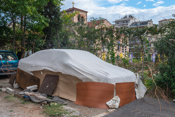 Covered car in Thessaloniki city, Greece - obrazy, fototapety, plakaty