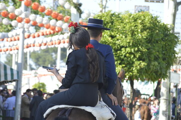 Horse riders in the world famous April Fair of Seville, Andalusia, Spain
