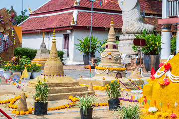 Thai people come to build the Sand Pagoda for return the sand to the temple on Songran festival at...