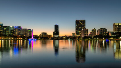 Orlando city skyline at night. Panoramic view of Orlando  city in Lake Eola, Florida, USA