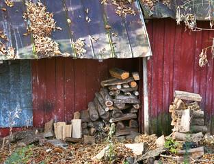Country Style Woodpile by Red Barn