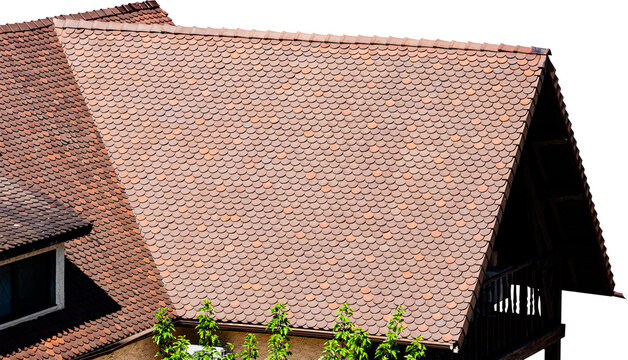 Roof of a house made of brown fish-scale tiles, isolated.