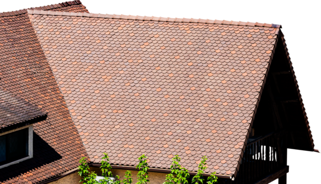 Roof of a house made of brown fish-scale tiles, isolated.