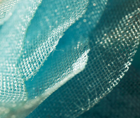 blue tulle object detail, close-up background.