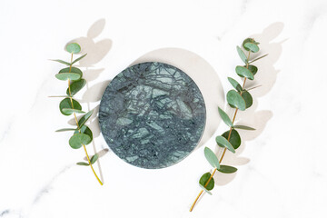 Eucalyptus-Decorated Podiums for Elegant Presentation