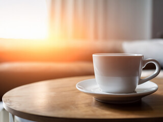 Morning Coffee Cup Mug on Living Room Table with Blur Background