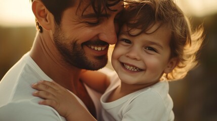 Happy father and son, smiling Latino young father holding his beloved baby boy have a good time together, closeup portrait, for family, father's day, men's happiness, have fun, copy space.