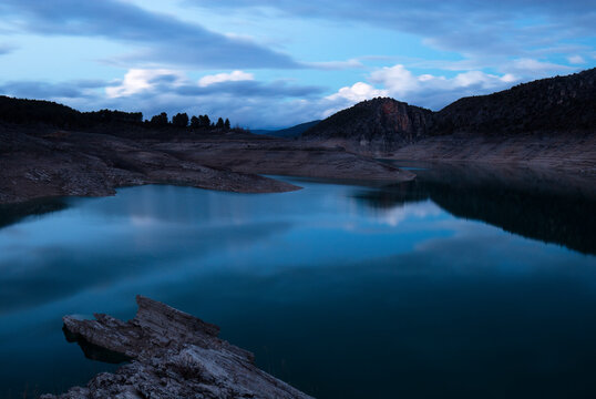 Tranquil dusk scene at a serene mountain lake