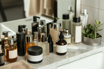 Close-up of men's skincare and grooming products neatly arranged on a bathroom countertop