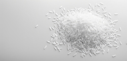 Fototapeta premium Pile of shredded rice on top of a table. Suitable for food and cooking concepts