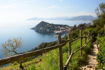 Tuinposter The hiking trail to Punta Manara. Sestri Levante. Liguria. Italy © Bluchiavari
